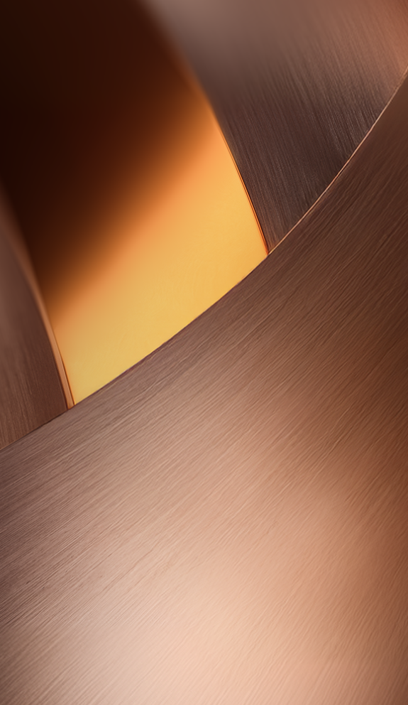 Background image featuring elegant metallic curves in bronze and gold tones, representing Ploom’s premium design. Pre-register now to be among the first to discover Ploom in Saudi Arabia.